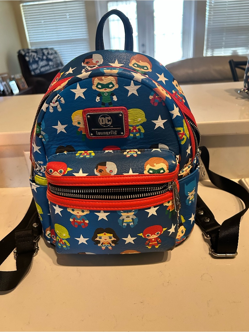 Loungefly Blue DC Kids Mini Backpack with Multicolor Superhero Print